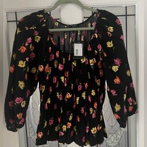 Kate spade blouse with small flower and long sleeves and smocking in the waist
